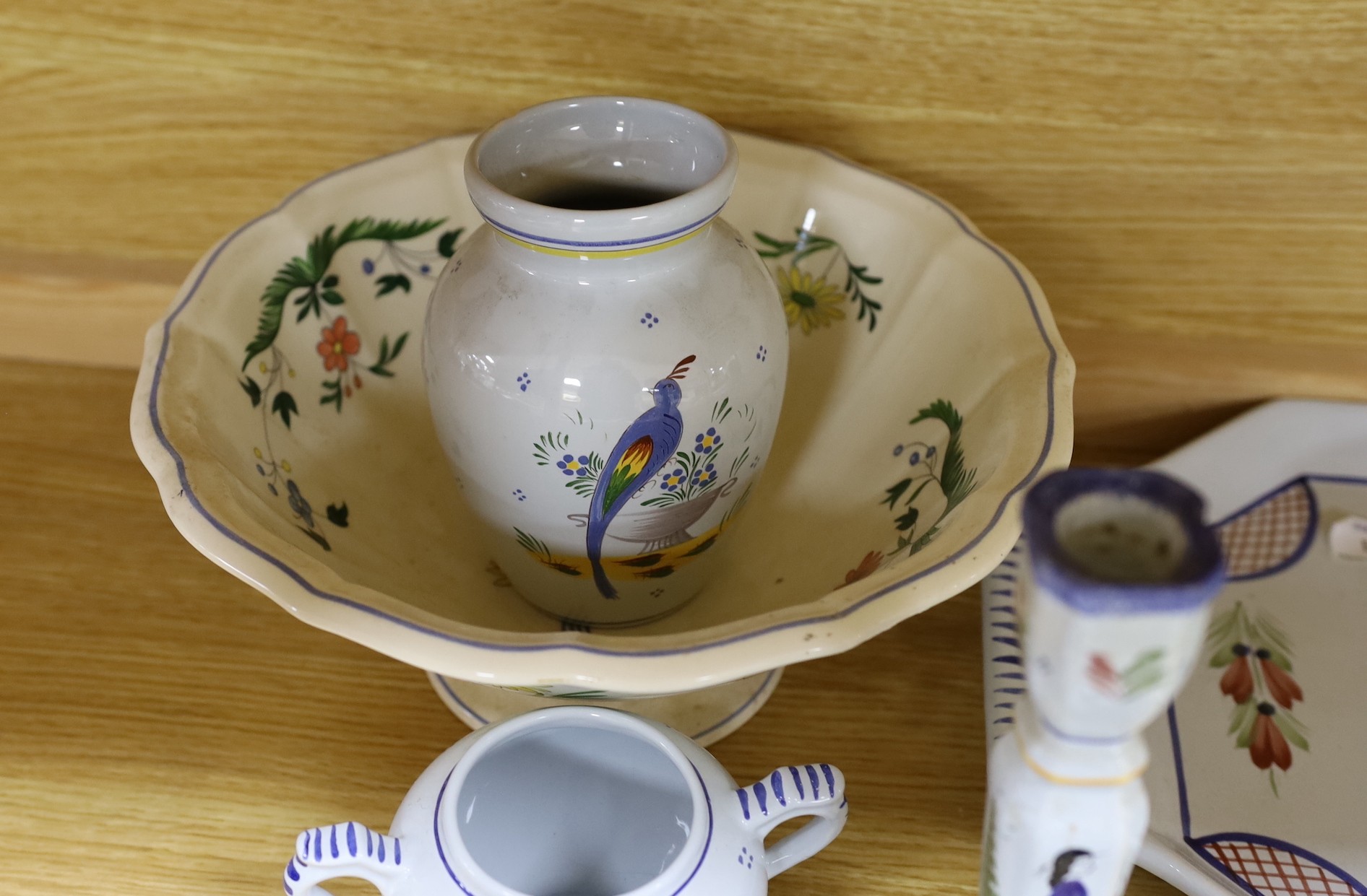 A collection of French Quimper tablewares